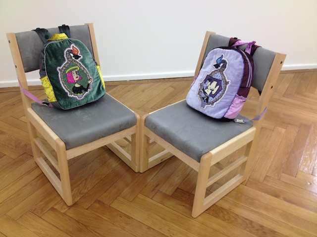 Bunny Rogers 'State Skool Chairs', 2014 Maple wood, grey faux suede, custom-made backpacks, custom-made ballet slippers 95 x 113 x 113 cm