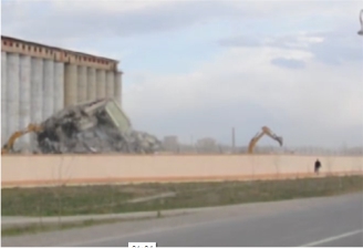 Zamir Suleymanov / ALL THE MACHİNES CARRY OİL / This is one of the videos of the 'BB Dictaphone' project. The video portrays the motion of machines while a Nakhchivan mill is demolished in the background. *The cinematographer is Rafael Rzae